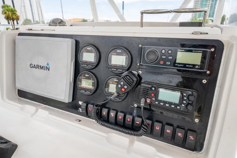 Slide: The Image of Control panel of a 2004 Jupiter 27fs boat with Garmin navigation system. - 19