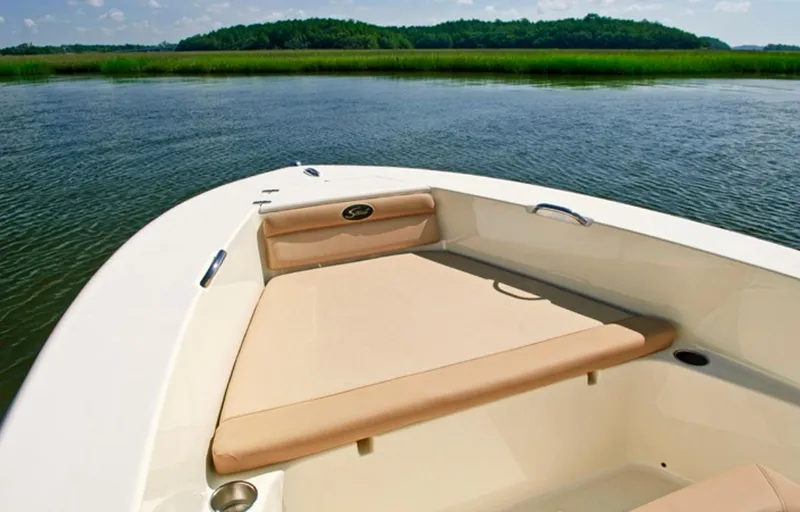 Slide: The Image of Manufacturer Provided Image: 2014 Scout 195 Sportfish boat on calm water with scenic background. - 9