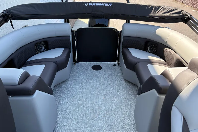 Slide: The Image of Interior of 2026 Premier 210 Sunsation RF pontoon boat with luxurious seating. - 4