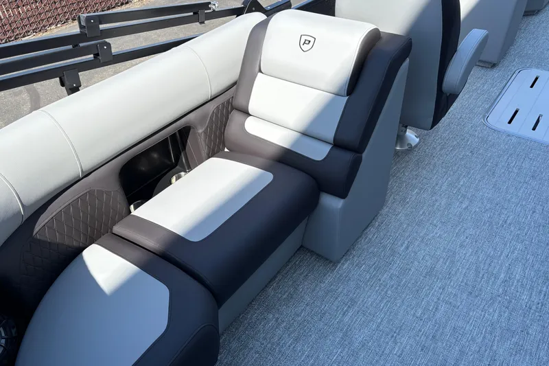 Slide: The Image of Luxurious seating on 2026 Premier 210 Sunsation RF pontoon boat, featuring modern design and comfort. - 7
