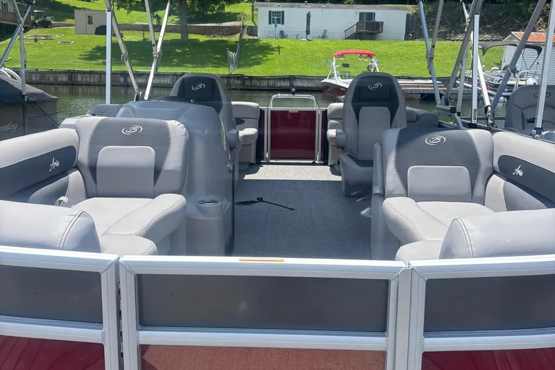 Slide: The Image of 2025 Barletta ARIA 22QC pontoon boat with spacious seating and modern design. - 3