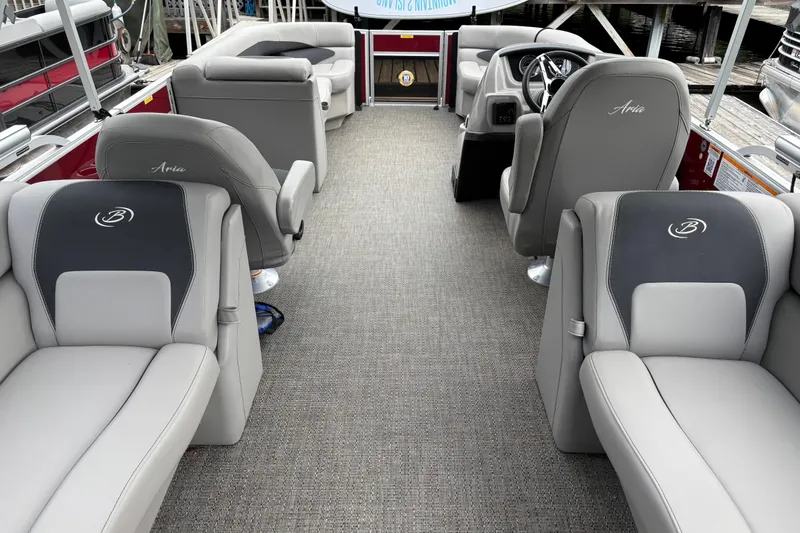 Slide: The Image of 2025 Barletta ARIA 22QC pontoon boat interior with luxurious seating and modern design. - 7