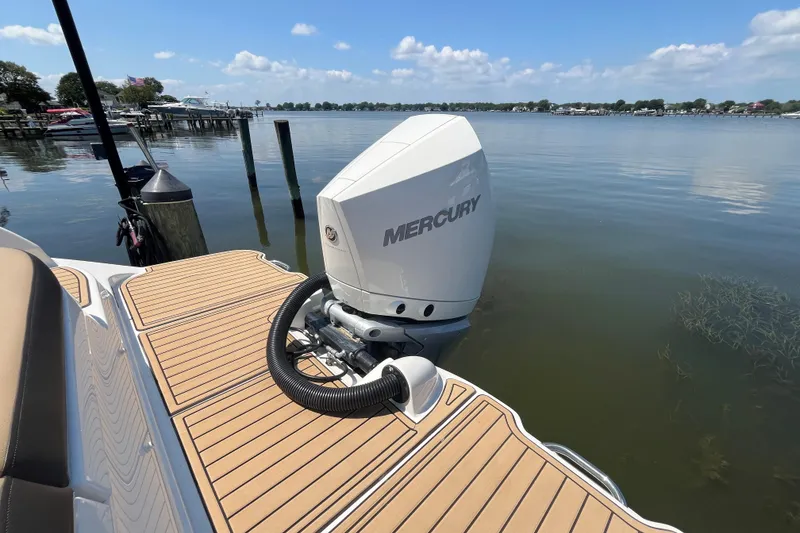 Slide: The Image of 2021 Sea Ray SDX 270 Outboard with Mercury engine on calm lake. - 4
