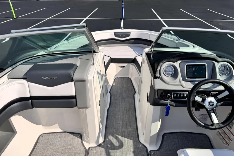 Slide: The Image of 2019 Chaparral Vortex 203 VRX boat interior with steering wheel and dashboard. - 17