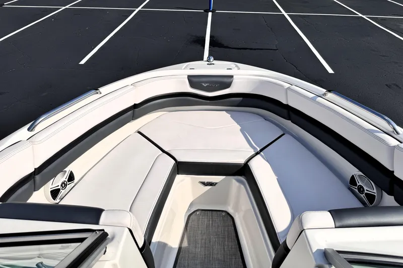 Slide: The Image of 2019 Chaparral Vortex 203 VRX boat interior with white seating and speakers. - 18