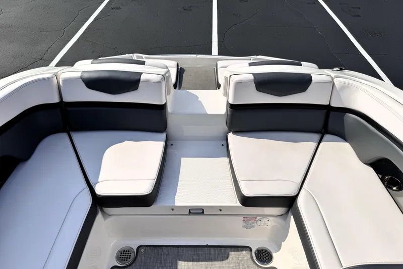 Slide: The Image of 2019 Chaparral Vortex 203 VRX boat interior with white and gray seating. - 20