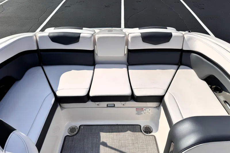 Slide: The Image of 2019 Chaparral Vortex 203 VRX boat interior with cushioned seating and modern design. - 21