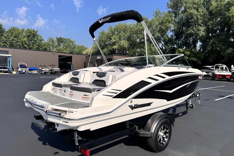 Slide: The Image of 2019 Chaparral Vortex 203 VRX boat on trailer in parking lot. - 4