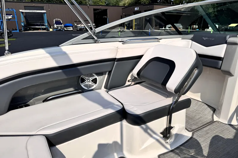 Slide: The Image of 2019 Chaparral Vortex 203 VRX boat interior with seating and speaker. - 8