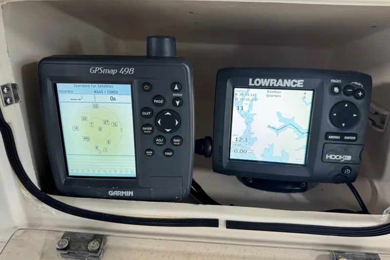 Slide: The Image of Garmin GPSmap 498 and Lowrance Hook 5 on 2000 Grady-White Fisherman 180 boat. - 10