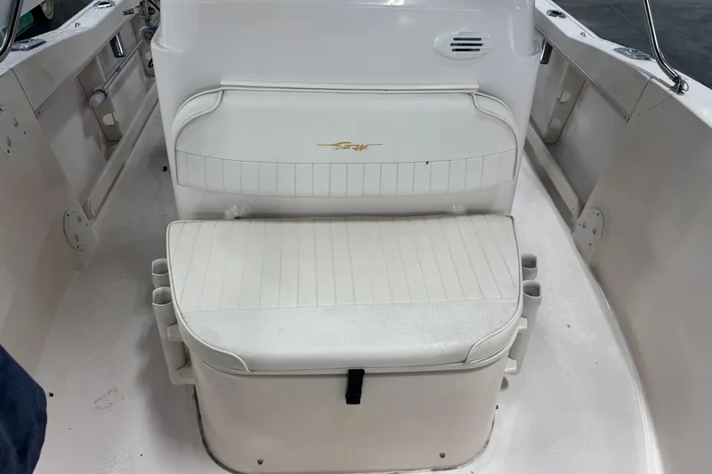 Slide: The Image of Grady-White Fisherman 180 boat interior, featuring white cushioned seating, 2000 model. - 13