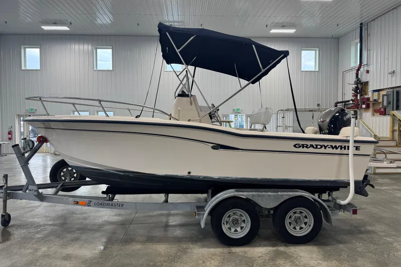 Slide: The Image of 2000 Grady-White Fisherman 180 boat on trailer in indoor storage facility. - 2