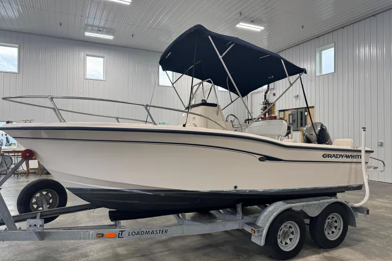 Slide: The Image of 2000 Grady-White Fisherman 180 boat on trailer in indoor storage. - 4