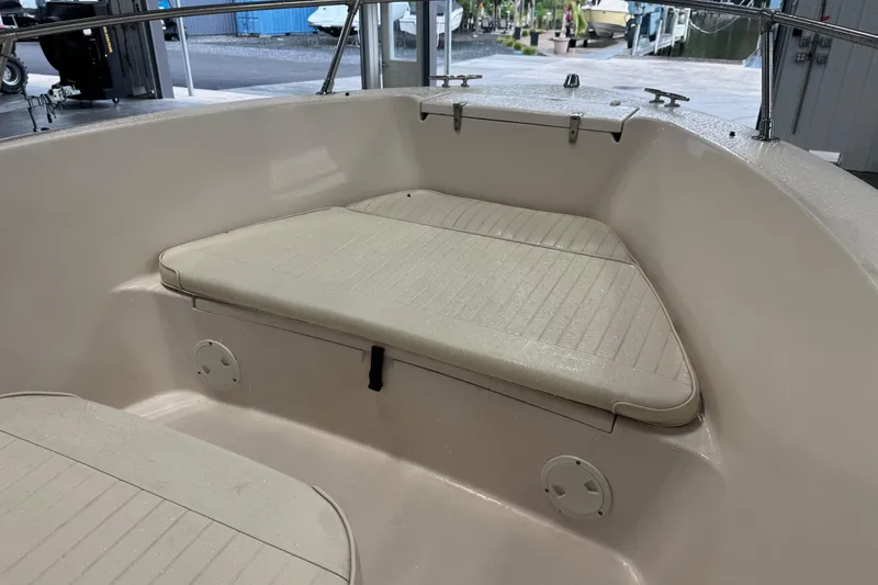 Slide: The Image of 2000 Grady-White Fisherman 180 boat interior with cushioned seating area. - 7