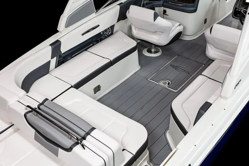 Slide: The Image of Manufacturer Provided Image: 2023 Chaparral 307 SSX boat interior with white and gray seating. - 12