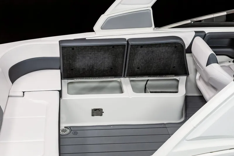 Slide: The Image of Manufacturer Provided Image: 2023 Chaparral 307 SSX boat interior seating and storage compartments. - 14