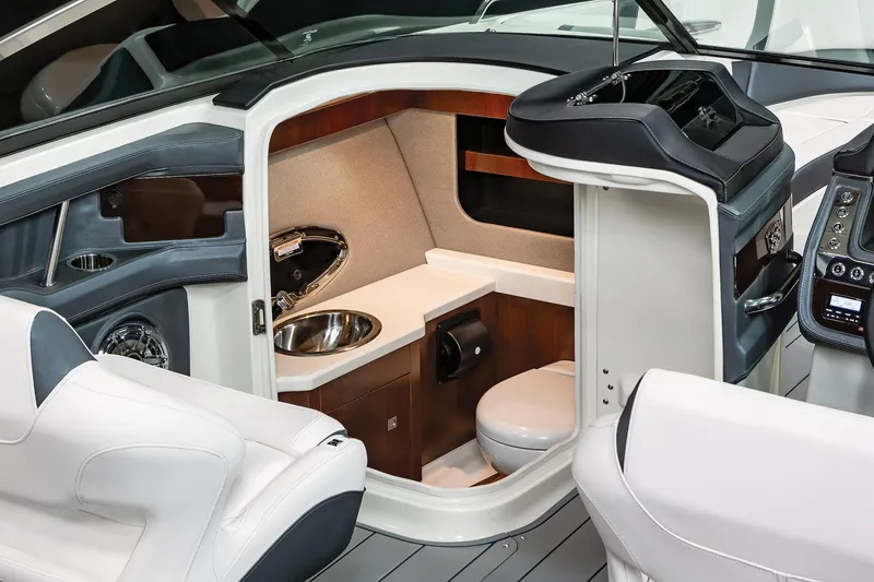 Slide: The Image of Manufacturer Provided Image: 2023 Chaparral 307 SSX boat interior with sink and toilet. - 19