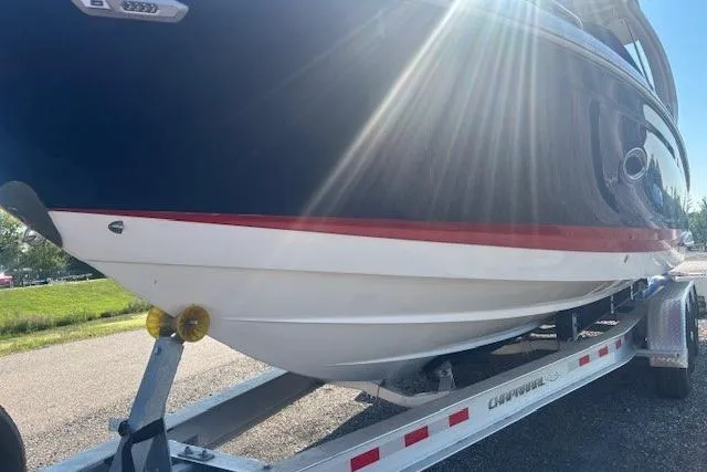 Slide: The Image of 2023 Chaparral 307 SSX boat on trailer, sunlit, side view. - 36