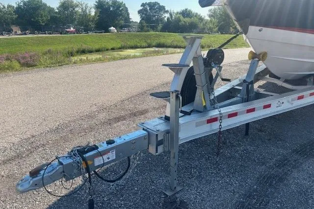 Slide: The Image of Trailer hitch of 2023 Chaparral 307 SSX boat on a sunny day. - 37