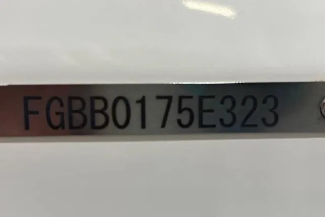 Slide: The Image of 2023 Chaparral 307 SSX boat identification number plate, displaying "FGBB0175E323". - 59
