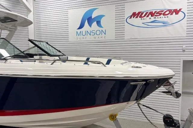 Slide: The Image of 2023 Chaparral 307 SSX boat displayed at Munson Ski & Marine showroom. - 67