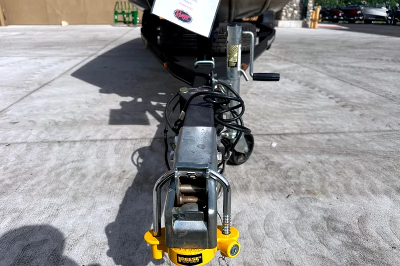 Slide: The Image of Trailer hitch of a 2017 Ranger RT188 boat on concrete surface. - 18