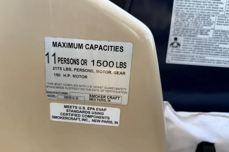 Slide: The Image of 2019 SunChaser Geneva Cruise 22 LR PSB capacity label, 11 persons or 1500 lbs, 150 HP motor. - 10