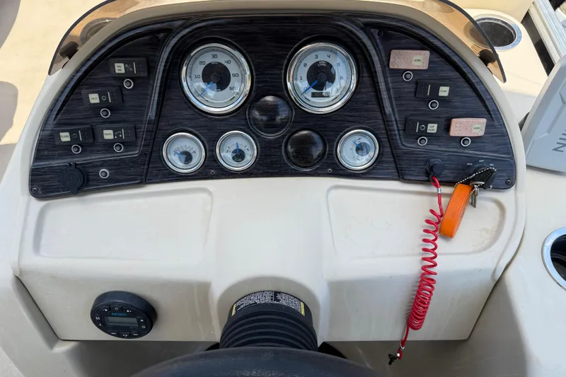 Slide: The Image of Dashboard of 2019 SunChaser Geneva Cruise 22 LR PSB with gauges and controls. - 12