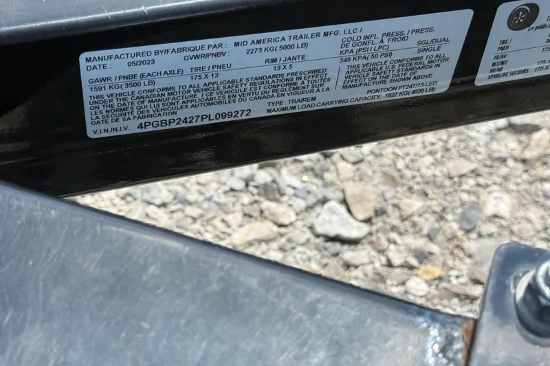 Slide: The Image of Label on trailer hitch of 2019 SunChaser Geneva Cruise 22 LR PSB, showing specifications and VIN. - 25