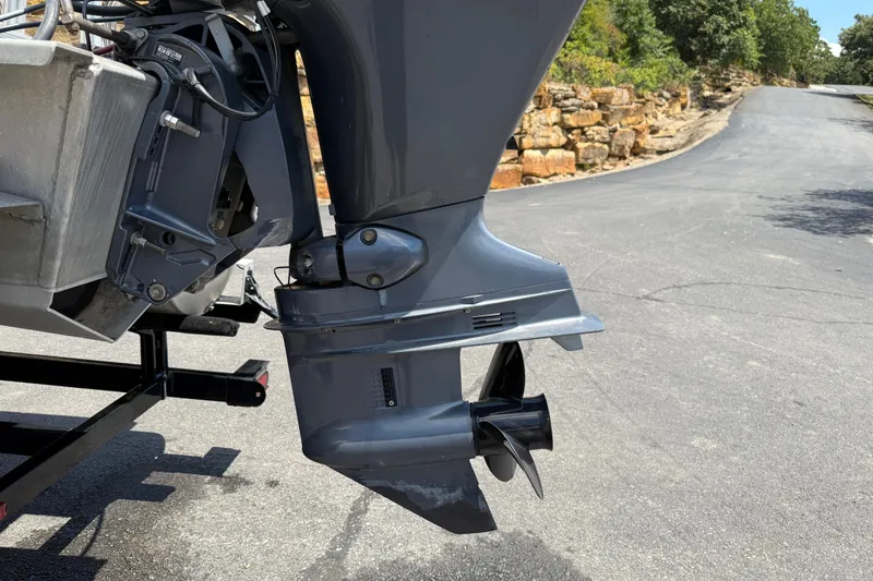 Slide: The Image of 2019 SunChaser Geneva Cruise 22 LR PSB boat motor and propeller on a trailer. - 6