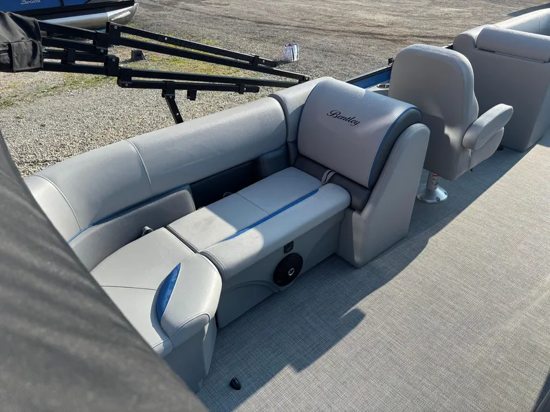 Slide: The Image of 2025 Bentley Pontoons Legacy Navigator interior with luxurious seating and modern design. - 3