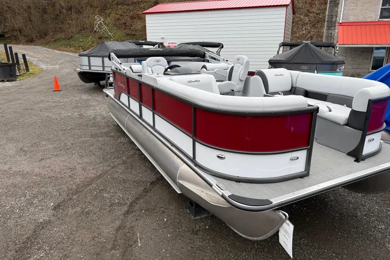 Slide: The Image of 2025 Bentley Pontoons Legacy Navigator with sleek design and spacious seating. - 8
