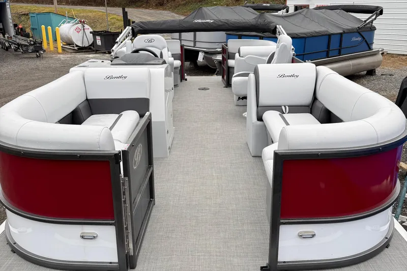 Slide: The Image of 2025 Bentley Pontoons Legacy Navigator with spacious seating and elegant design. - 9