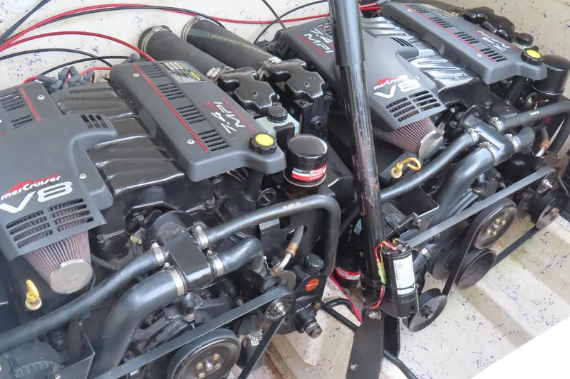 Slide: The Image of Twin MerCruiser V8 engines in a 1998 Magic 34 Sorcerer boat. - 17