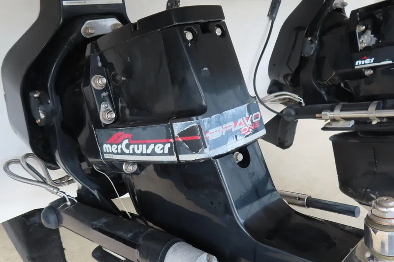 Slide: The Image of MerCruiser Bravo One engine on 1998 Magic 34 Sorcerer boat. - 19