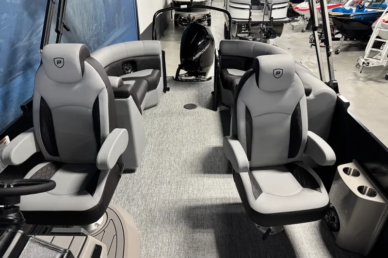 Slide: The Image of Interior of 2026 Premier 230 SunSation RF pontoon boat with luxurious seating. - 11