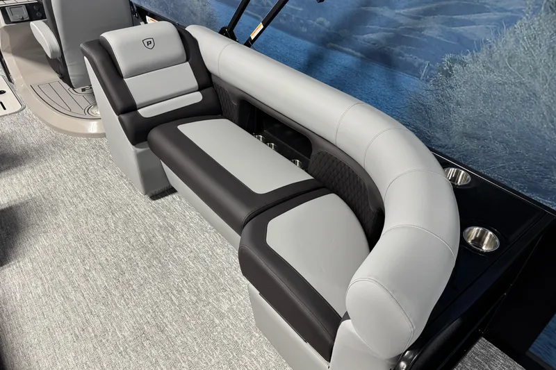 Slide: The Image of Luxurious seating on 2026 Premier 230 SunSation RF pontoon boat, featuring sleek design and comfort. - 16