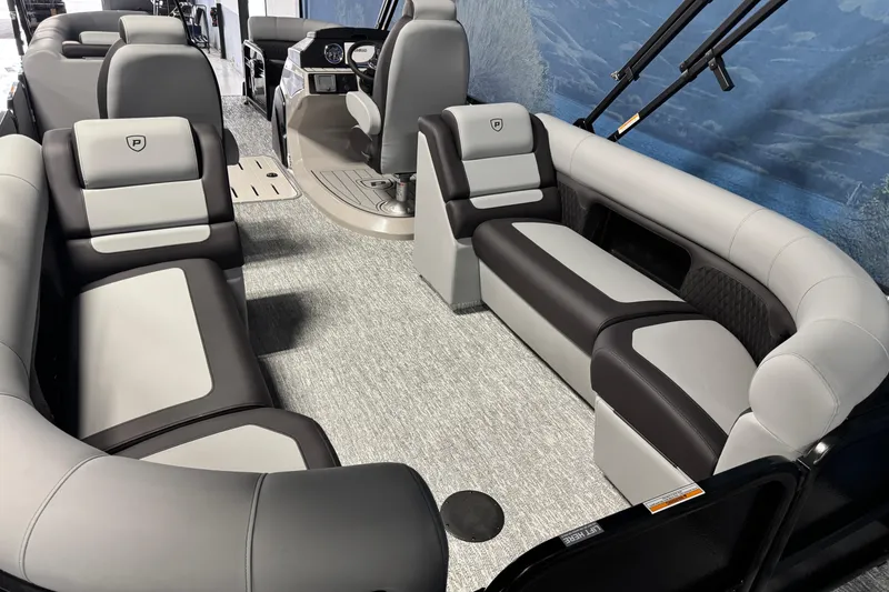 Slide: The Image of 2026 Premier 230 SunSation RF pontoon boat interior with luxurious seating and modern design. - 17