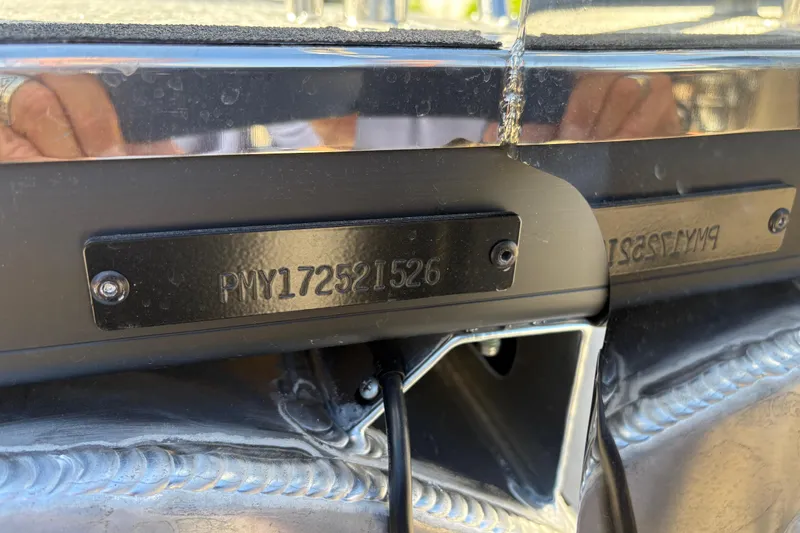 Slide: The Image of Close-up of the 2026 Premier 230 Sunsation RL boat's serial number plate. - 11