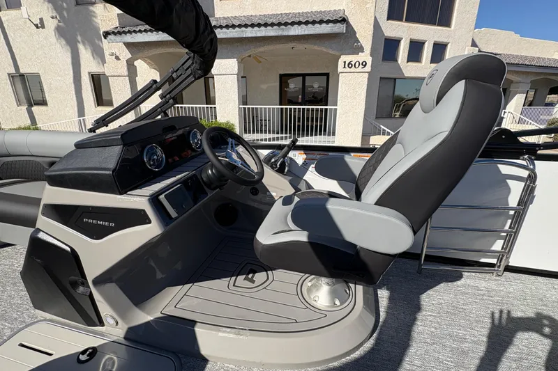 Slide: The Image of 2026 Premier 230 Sunsation RL boat helm with modern controls and comfortable seating. - 3