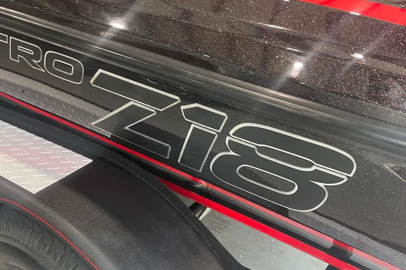 Slide: The Image of 2020 Nitro Z18 boat with sleek black and red design details. - 10