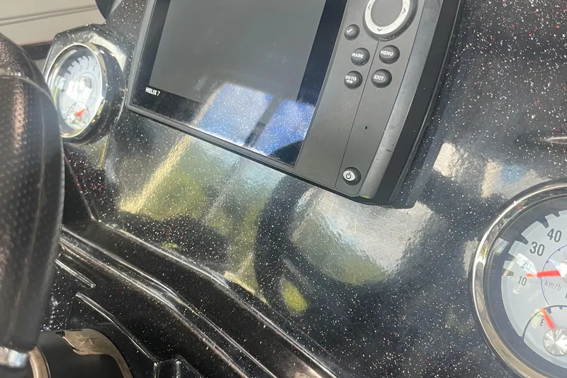 Slide: The Image of Dashboard of a 2020 Nitro Z18 boat with gauges and a control panel. - 12