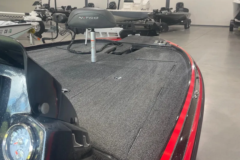 Slide: The Image of 2020 Nitro Z18 boat interior with fishing deck and equipment. - 13