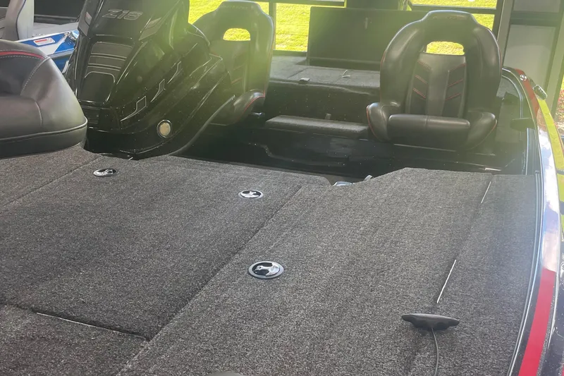 Slide: The Image of 2020 Nitro Z18 boat interior with carpeted deck and seating. - 4