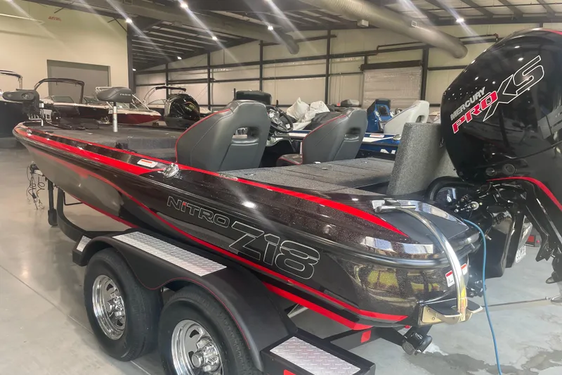 Slide: The Image of 2020 Nitro Z18 boat with Mercury Pro XS engine in showroom. - 9