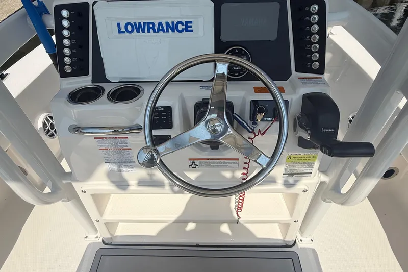 Slide: The Image of Steering console of 2022 Robalo 226 Cayman boat with Lowrance electronics. - 15