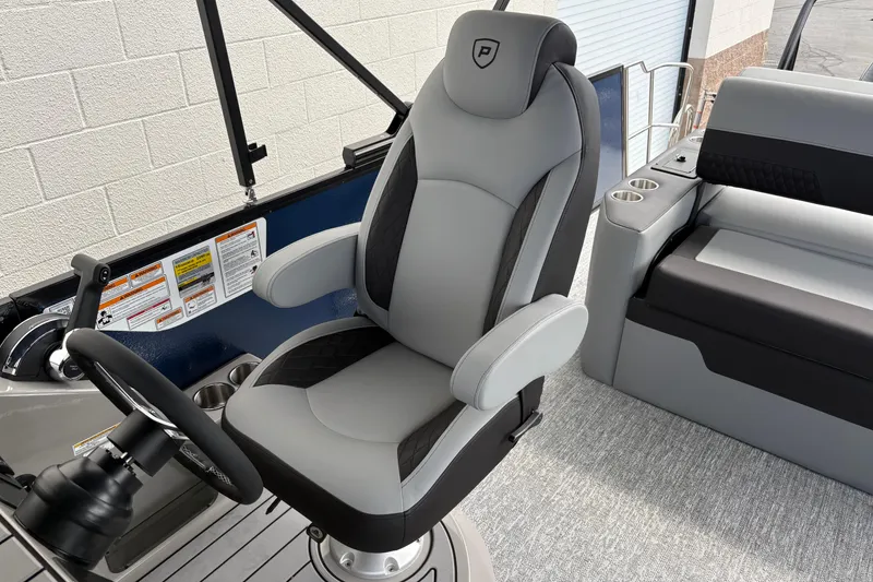 Slide: The Image of Captain's chair on 2026 Premier 230 Sunsation RL pontoon boat, featuring sleek design and comfortable seating. - 12