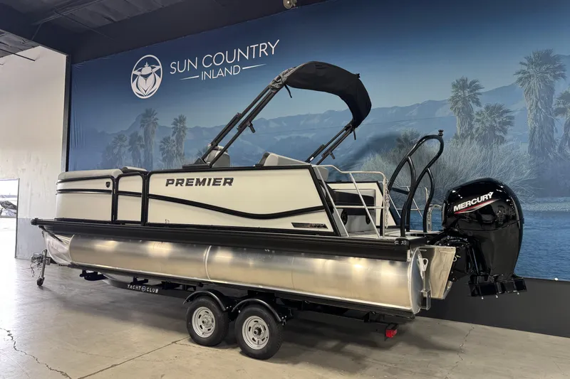 Slide: The Image of 2026 Premier 210 Sunsation RL pontoon boat with Mercury engine in showroom. - 4