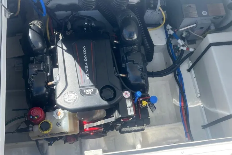 Slide: The Image of Engine compartment of a 2020 Four Winns V255 boat with Volvo Penta 280 V6 engine. - 8