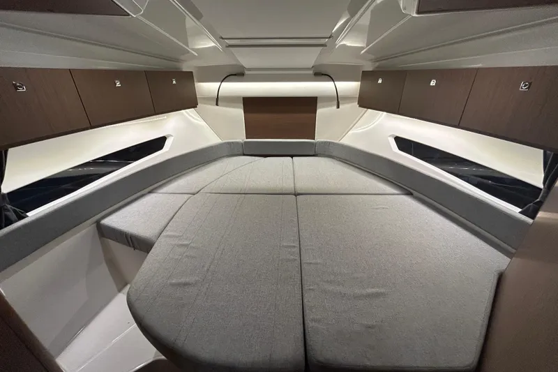 Slide: The Image of Modern kitchen area in a 2020 Beneteau Antares boat, featuring a sink and stove. - 15